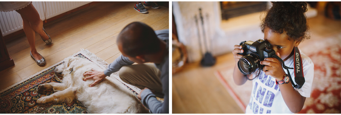 boy taking a picture of a dog