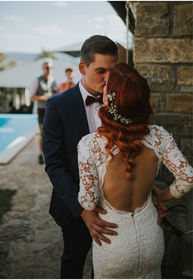 bride and groom kiss
